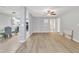 Open-concept area with a view of the modern kitchen, toilet, and dining area, perfect for entertaining at 2520 Friedland Pl # 102, Raleigh, NC 27617