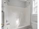 Bathroom shower-tub combo with jacuzzi, toilet, and window at 262 Tillamook Dr, Wake Forest, NC 27587