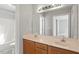 Bathroom with double sink vanity, large mirror, and shower-tub combo at 262 Tillamook Dr, Wake Forest, NC 27587