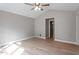 Spacious bedroom with hardwood floors, neutral walls, and vaulted ceilings at 262 Tillamook Dr, Wake Forest, NC 27587