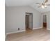 Spacious bedroom with hardwood floors and ensuite bathroom access at 262 Tillamook Dr, Wake Forest, NC 27587