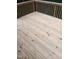 New wood deck with wooden railing is great for entertaining or relaxing at 262 Tillamook Dr, Wake Forest, NC 27587