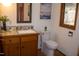 Cozy bathroom featuring a decorative sink vanity and a toilet in a charming setting at 2819 Meacham Rd, Chapel Hill, NC 27516