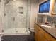 Modern bathroom featuring a glass shower with white marble tile and granite countertop at 2819 Meacham Rd, Chapel Hill, NC 27516