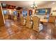 Bright dining area featuring terra cotta flooring, modern lighting, and ample sunlight at 2819 Meacham Rd, Chapel Hill, NC 27516