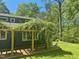 Exterior showcasing a house with a backyard pergola and flowering vines at 2819 Meacham Rd, Chapel Hill, NC 27516