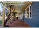 Inviting pergola-covered porch, with brick flooring, perfect for relaxation and enjoying the outdoors at 2819 Meacham Rd, Chapel Hill, NC 27516