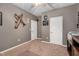 Comfortable bedroom featuring neutral walls and carpeted flooring at 295 Barbour Farm Ln, Four Oaks, NC 27524
