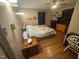 Cozy bedroom featuring a ceiling fan and hardwood floors at 300 Grove St, Oxford, NC 27565
