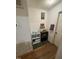 Hallway with hardwood floors and shelving at 300 Grove St, Oxford, NC 27565