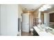 Bright bathroom features a shower with tub and a vanity with ample counter space at 3005 Domaine Dr, Wake Forest, NC 27587