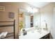 Bathroom features a large mirror, single sink vanity, and shower with tub at 3005 Domaine Dr, Wake Forest, NC 27587