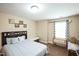 Bedroom features a queen bed, window, and a crib at 3005 Domaine Dr, Wake Forest, NC 27587
