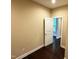 Cozy bedroom featuring a door frame and dark hardwood floors at 3005 Domaine Dr, Wake Forest, NC 27587