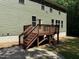 Wooden deck featuring stairs for easy access to the backyard at 3005 Domaine Dr, Wake Forest, NC 27587