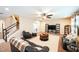Inviting living room featuring a ceiling fan and plush seating arrangement at 3005 Domaine Dr, Wake Forest, NC 27587