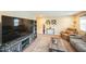Cozy living room features a comfortable seating arrangement and entertainment center at 3005 Domaine Dr, Wake Forest, NC 27587
