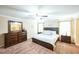 A spacious main bedroom with a ceiling fan and lots of natural light at 3005 Domaine Dr, Wake Forest, NC 27587