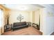 Sitting area with love seat, side tables, wall decor, and natural light at 3005 Domaine Dr, Wake Forest, NC 27587