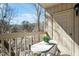 Private balcony with table and chairs, perfect for relaxing outdoors at 311 Swift Ave Ave # 202, Durham, NC 27705