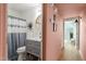 Bathroom view with modern vanity, round mirror, and coordinated decor at 311 Swift Ave Ave # 202, Durham, NC 27705