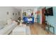 Open concept living and dining area with wood floors and neutral tones at 311 Swift Ave Ave # 202, Durham, NC 27705