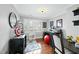 Bright office with hardwood floors, desk, window with plantation shutters, and fun decor at 400 Edinburgh Dr, Cary, NC 27511