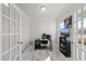 Bright office featuring French doors, neutral walls, and a large window at 449 Willard Woods Dr, Wendell, NC 27591