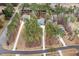 Aerial shot of the property showcases its spacious layout, surrounding greenery, and prime location at 49 Bonterra Way, Chapel Hill, NC 27516
