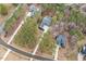 Stunning aerial view of the homes showing the community layout, landscaping, and tranquil surroundings at 49 Bonterra Way, Chapel Hill, NC 27516