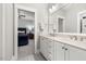 Bathroom with double sinks, granite countertops, and modern fixtures at 49 Bonterra Way, Chapel Hill, NC 27516