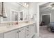 Bathroom featuring double sinks, a large mirror, and modern fixtures at 49 Bonterra Way, Chapel Hill, NC 27516