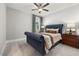 Comfortable bedroom with soft carpet and large windows at 49 Bonterra Way, Chapel Hill, NC 27516