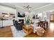 Inviting living room features a fireplace, built-in shelving, and an open concept layout at 49 Bonterra Way, Chapel Hill, NC 27516