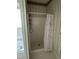 Bathroom shower with floral curtain at 4909 Willow Tree Ln, Clayton, NC 27520