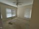 Bright bedroom featuring neutral carpet and natural light at 4909 Willow Tree Ln, Clayton, NC 27520