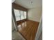 Dining room featuring hardwood floors and large windows at 4909 Willow Tree Ln, Clayton, NC 27520