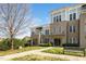 Attractive brick building with a manicured lawn, bench and landscaping at 501 Finsbury St # 100, Durham, NC 27703