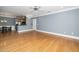 Large, open living area boasting hardwood floors and a combined kitchen and dining space at 501 Finsbury St # 100, Durham, NC 27703