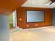 Large bonus room featuring a media screen, neutral carpet, and stairs at 501 Liberty Rose Dr, Morrisville, NC 27560