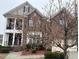 Traditional home with brick facade, upper level balcony, and manicured landscaping at 501 Liberty Rose Dr, Morrisville, NC 27560