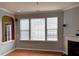 Spacious living room with natural light and a charming fireplace at 501 Liberty Rose Dr, Morrisville, NC 27560
