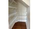 Pantry with wooden floors and ample shelving at 501 Liberty Rose Dr, Morrisville, NC 27560