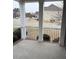 A view from the covered porch with black railings and concrete flooring at 501 Liberty Rose Dr, Morrisville, NC 27560
