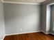 Neutral walls are complemented by hardwood floors in a room that is ready to be transformed into your perfect space at 501 Liberty Rose Dr, Morrisville, NC 27560