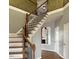 Grand two-story foyer with staircase featuring wood and iron railings, creating an elegant and welcoming entrance to the home at 501 Liberty Rose Dr, Morrisville, NC 27560