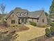 Lovely backyard features an outdoor patio, garden beds and established landscaping at 601 Golfers Vw, Pittsboro, NC 27312