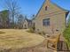 Spacious backyard with manicured lawn and lush landscaping at 601 Golfers Vw, Pittsboro, NC 27312