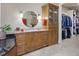 Bathroom featuring granite counters, custom cabinets, and decorative mirrors at 601 Golfers Vw, Pittsboro, NC 27312