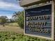 Community sign directs towards the golf club and property owner's clubhouse at 601 Golfers Vw, Pittsboro, NC 27312